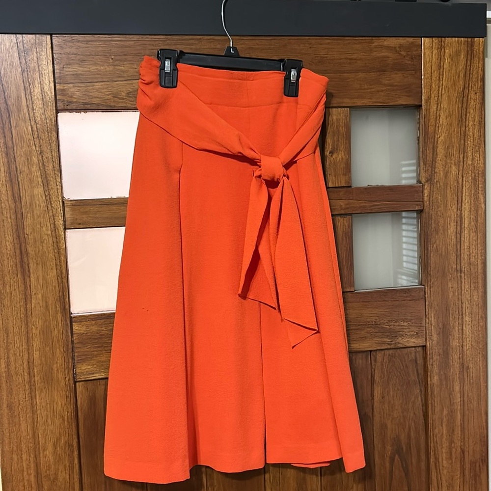 Cute bright orange skirt. Size 0, Ann Taylor.